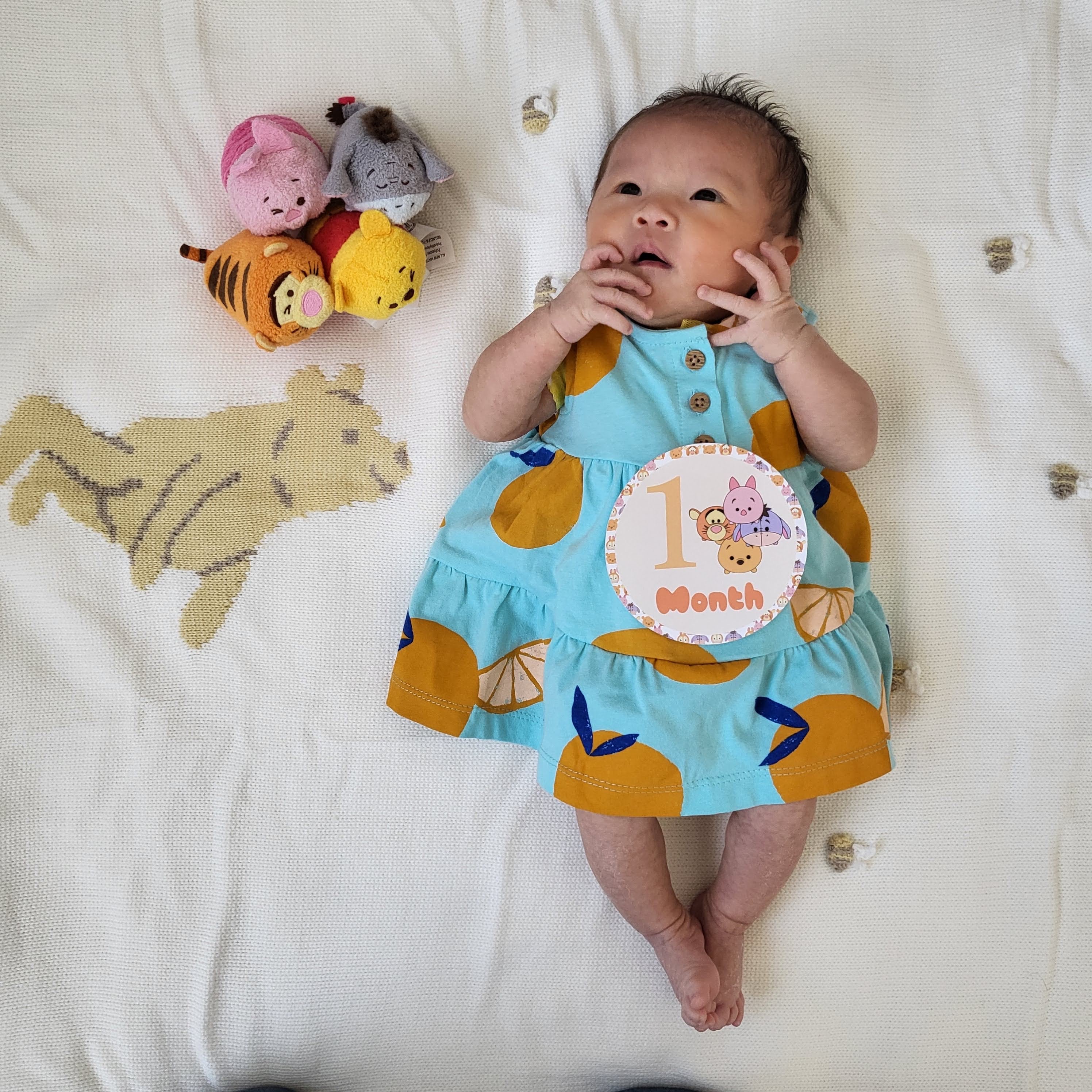 Rhea one month birthday, in skirt